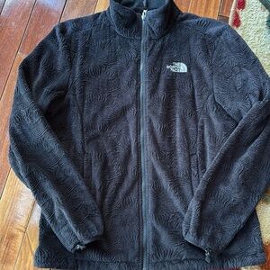 North Face black fleece with swirl pattern.